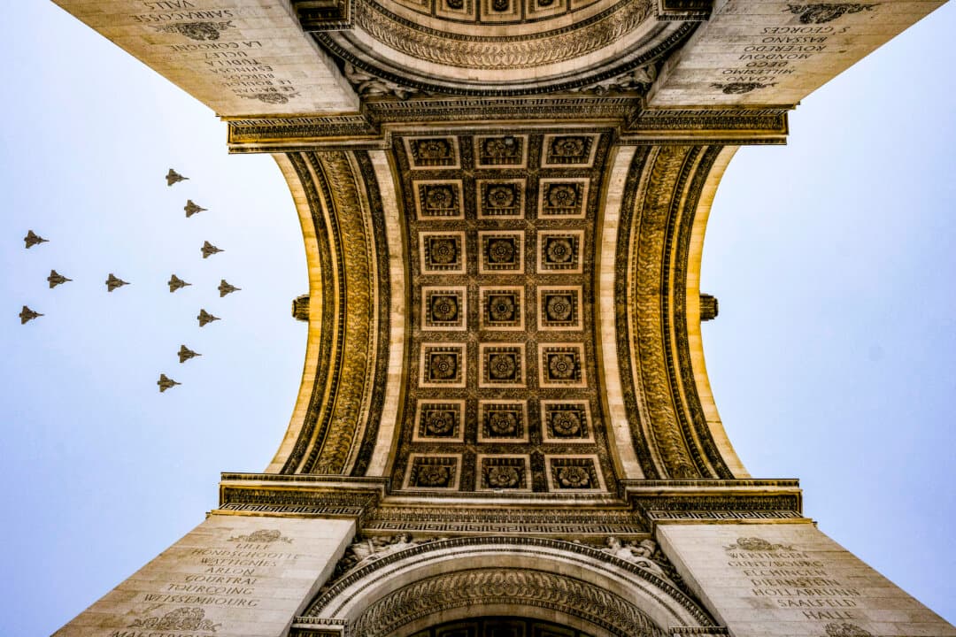 Rafale fighter jets fly over the Arc de Triomphe during a rehearsal ahead of the Bastille Day parade on the Champs-Elysees avenue in Paris on July 9, 2026. (Dimitar Dilkoff/AFP via Getty Images)
