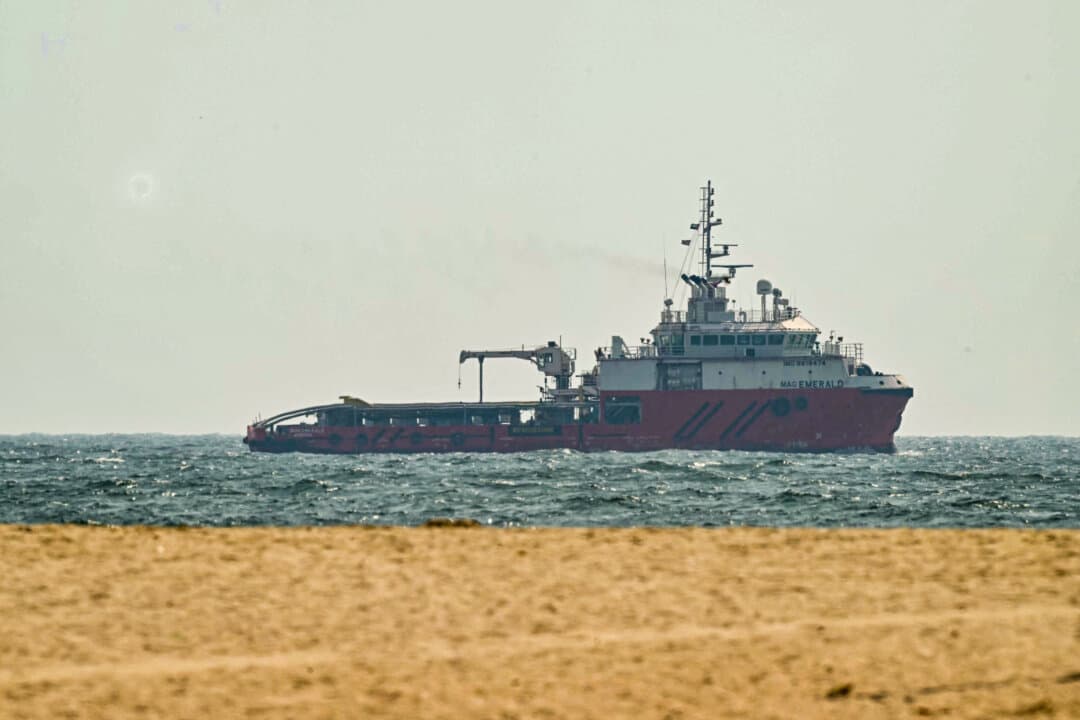 A ship sails off the coast of Ajman, United Arab Emirates, on July 10, 2026. Shipping traffic through the Strait of Hormuz has fallen sharply following attacks on vessels earlier in the week and renewed military strikes between the United States and Iran. (AFP via Getty Images)