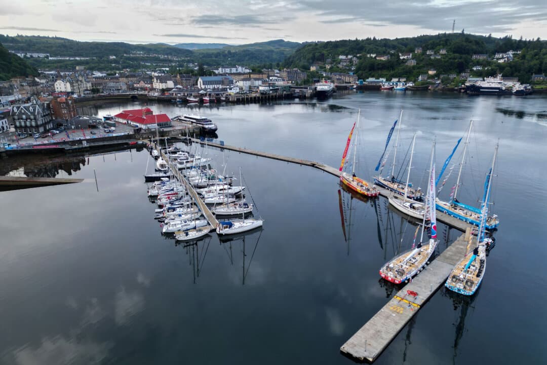 Yachts participating in the Clipper Round the World Yacht Race are moored in the harbor in Oban, Scotland, on July 10, 2026. The race's final stage is scheduled to depart from Oban on July 19, marking the beginning of the last leg of the circumnavigation to the overall finish in Portsmouth. (Jeff J Mitchell/Getty Images)