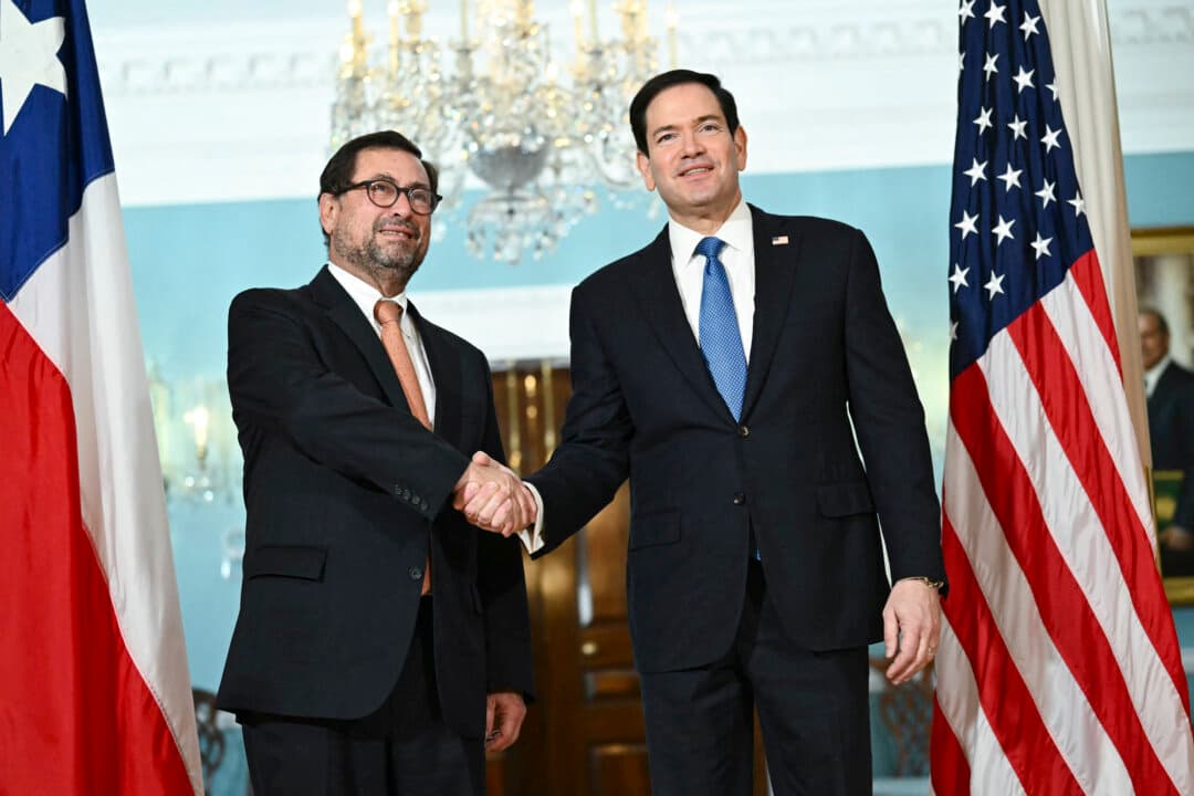 U.S. Secretary of State Marco Rubio shakes hands with Chilean Foreign Minister Francisco Pérez Mackenna (L) in the Treaty Room of the State Department in Washington on July 6, 2026. (Kent Nishimura/AFP via Getty Images)