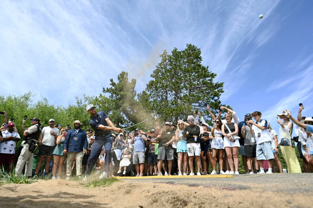 Stephen Curry plays his shot onto the 18th green during the second round of the American Century Championship 2026 at Edgewood Tahoe Golf Course in Stateline, Nev., on July 11, 2026. (Eakin Howard/Getty Images)