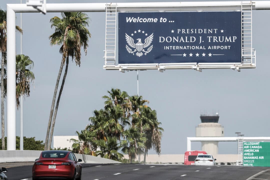 A sign welcomes drivers to the President Donald J. Trump International Airport in Palm Beach, Fla., on July 9, 2026. The airport formerly known as Palm Beach International Airport has officially been renamed President Donald J. Trump International Airport. (Joe Raedle/Getty Images)