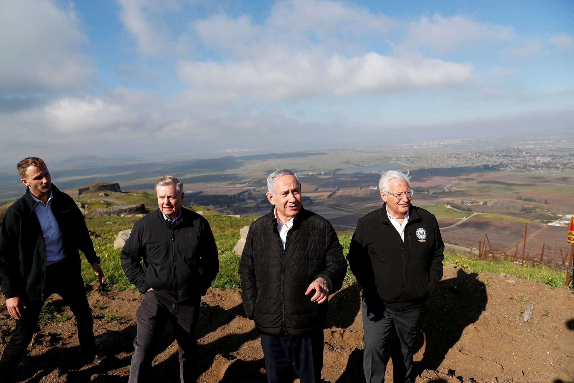 Israeli Prime Minister Benjamin Netanyahu, U.S. Sen. Lindsey Graham (R-S.C.), and U.S. Ambassador to Israel David Friedman visit the border line between Israel and Syria at the Golan Heights on March 11, 2019. (Ronen Zvulun/Reuters/File Photo)
