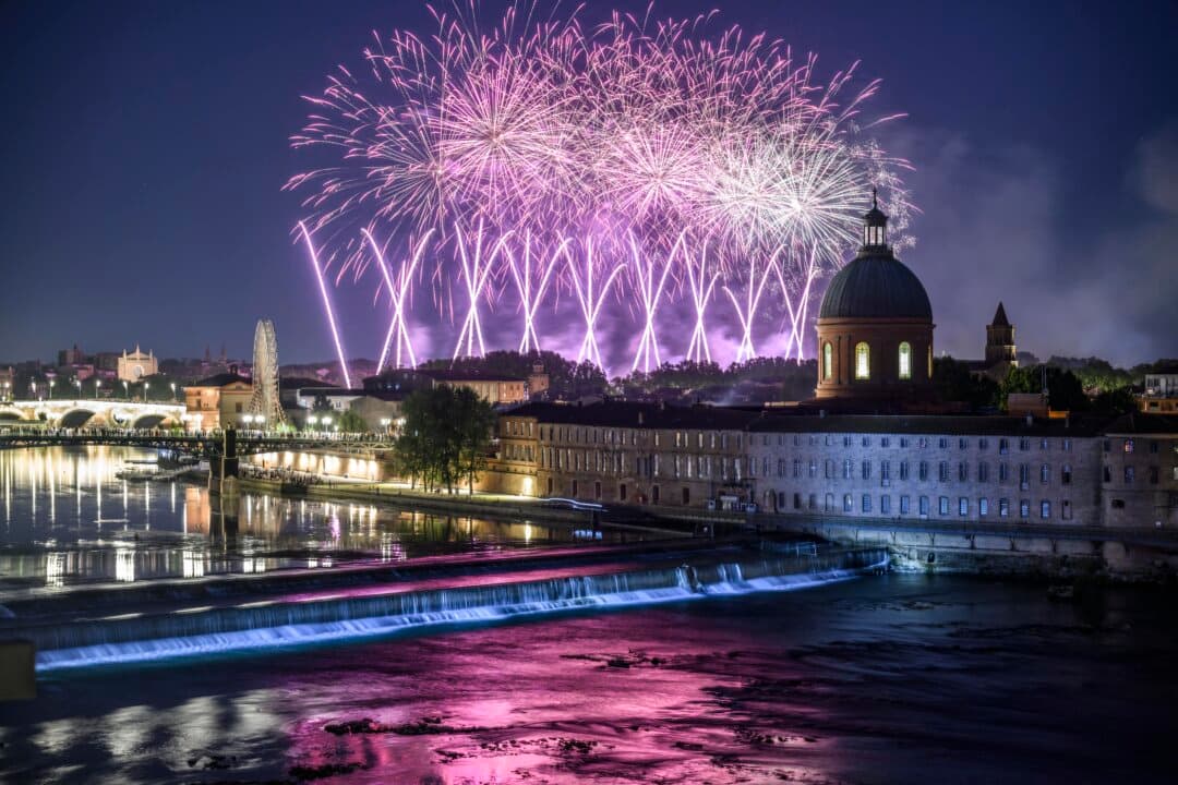 Fireworks light up the sky over the Garonne river as part of the annual Bastille Day celebrations in Toulouse, France, on July 13, 2026. (Ed Jones/AFP via Getty Images)