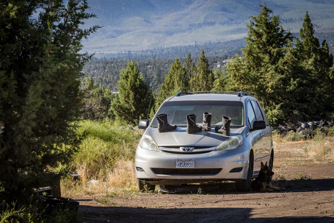 Boots belonging to workers on illegal marijuana farms sit on a vehicle outside of Montague, Calif., on June 4, 2026. An estimated 5,000 to 8,000 people now work at illegal grow sites in Siskiyou County. (John Fredricks/The Epoch Times)