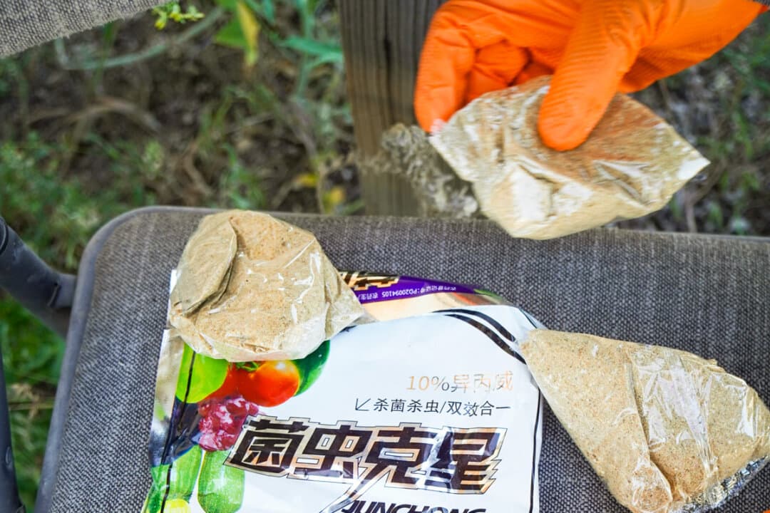 Chinese-labeled pesticides seized by Siskiyou County Sheriff Jeremiah LaRue at an illegal marijuana grow site in the Mount Shasta Vista subdivision in northern California on June 4, 2026. Some pesticides used at marijuana grows can be fatal if inhaled or cause severe skin irritation, respiratory problems, and neurological conditions. (Brad Jones/The Epoch Times)