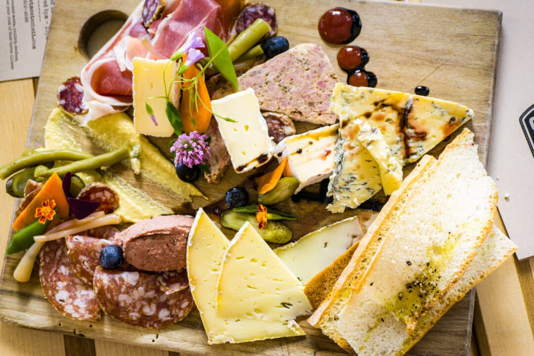 A selection of cheese and cured meat is displayed at Main Street Meats, a neighborhood butcher that sources from local farms, in Chattanooga, Tenn., on June 23, 2017. (Crystal Shi/The Epoch Times)