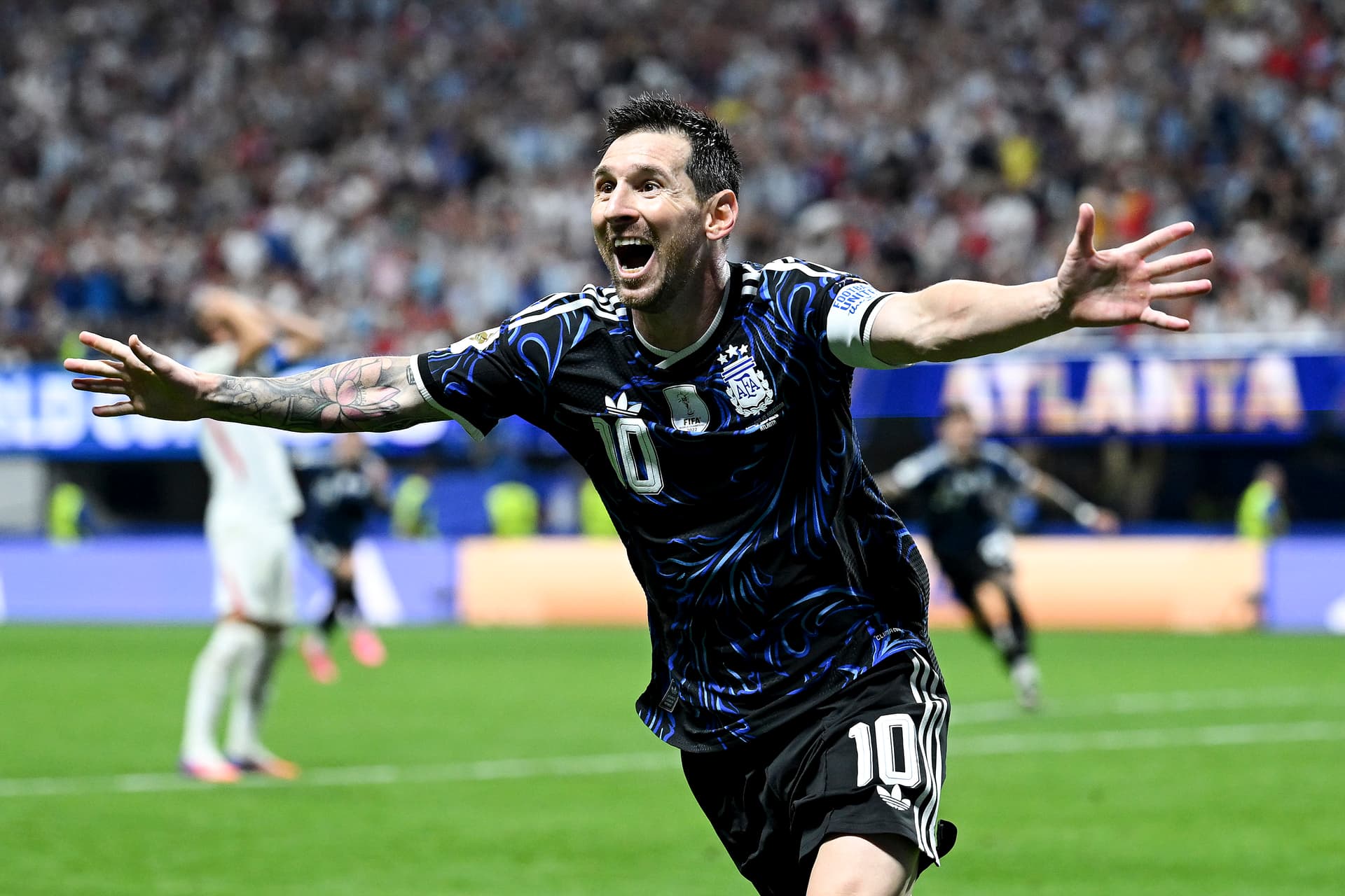 Lionel Messi of Argentina celebrates the team's second goal by Lautaro Martinez during the FIFA World Cup 2026 semifinal match against England at Atlanta Stadium in Atlanta, on July 15, 2026. (Shaun Botterill/Getty Images)