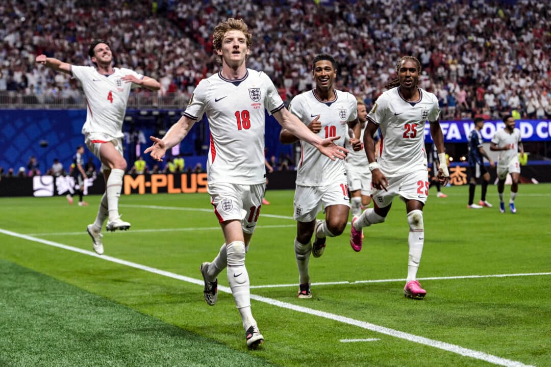 England's forward #18 Anthony Gordon (C) celebrates after scoring England's first goal during the 2026 World Cup football tournament semi-final match between England and Argentina at the Atlanta Stadium in Atlanta, Ga., on July 15, 2026. (Juan Mabromata/AFP via Getty Images)