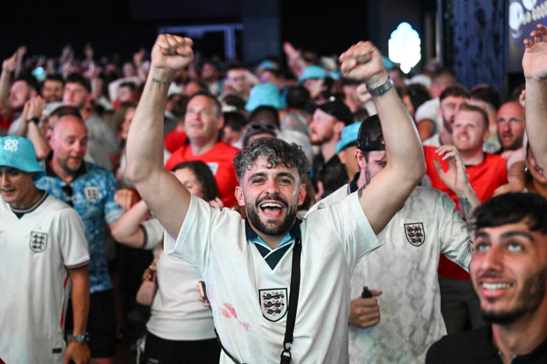 England fans celebrate during a watch party at Co-op Live for the FIFA World Cup 2026 quarterfinal match between Norway and England in Manchester, England, on July 11, 2026. (Anthony Devlin/Getty Images)