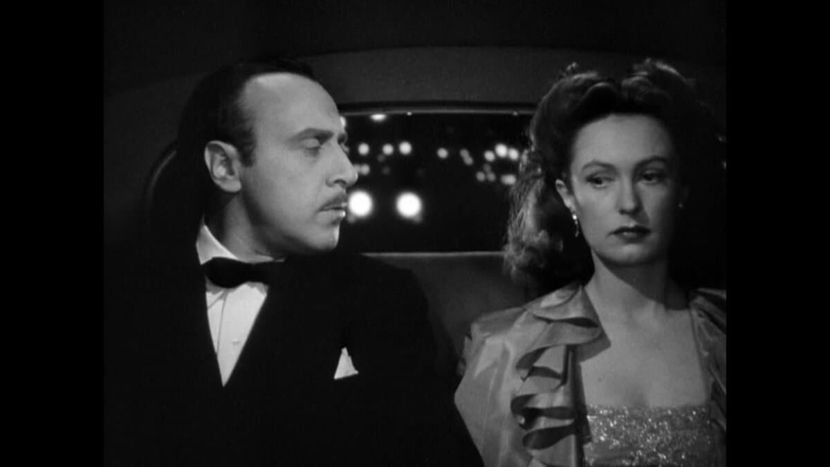 Count Teck de Brancovis (George Coulouris) and Countess Marthe (Geraldine Fitzgerald), in “Watch on the Rhine.” (Warner Bros. Pictures)