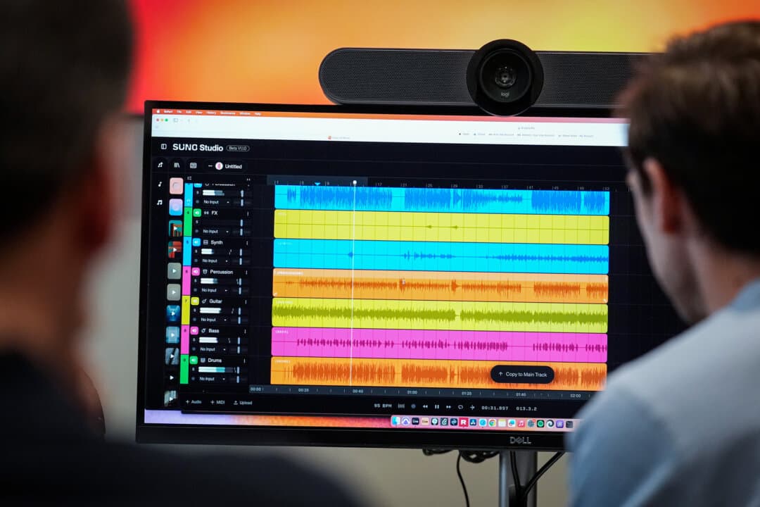 Waveforms of audio files from various instruments displayed on a computer screen during the creation of an AI musical piece at Suno headquarters in Cambridge, Mass., on Jan. 13, 2026. (Robert F. Bukaty/AP Photo)