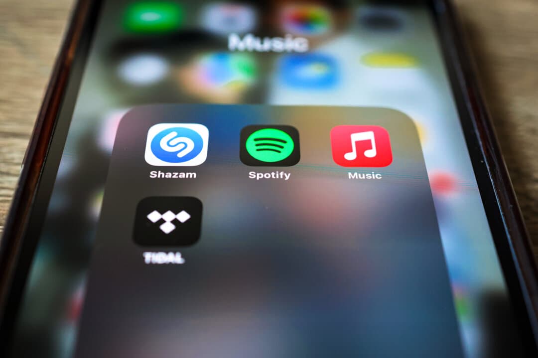 The Spotify music app displayed on a phone in New York City on June 4, 2024. With streaming platforms flooded with thousands of new releases daily, artists, labels, and listeners are forced to navigate an increasingly crowded content landscape. (Photo Illustration by Michael M. Santiago/Getty Images)