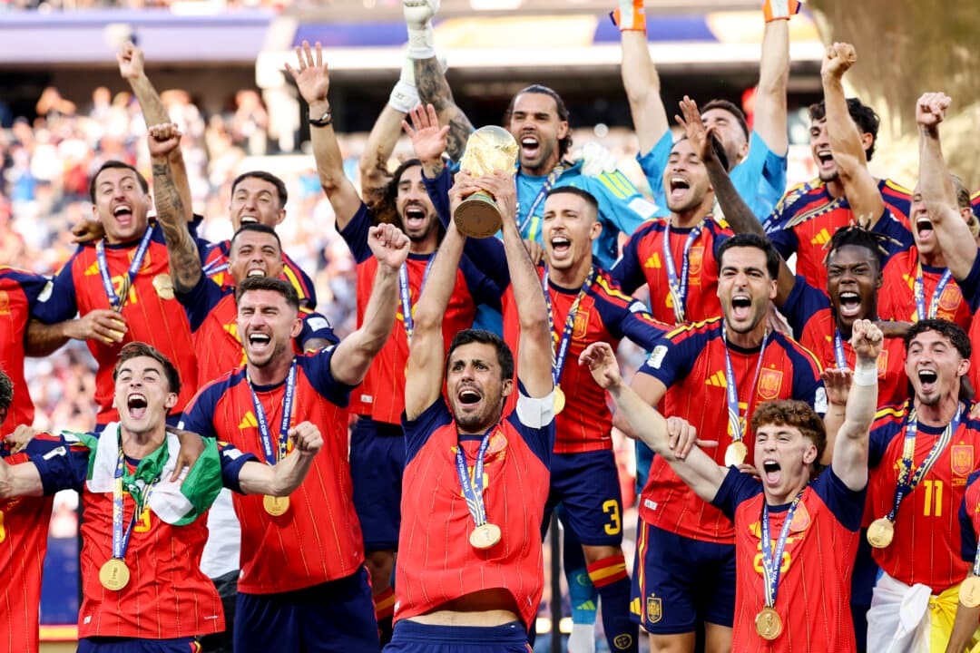Rodri #16 of Spain lifts the FIFA World Cup Winner’s Trophy after the team’s victory following during the FIFA World Cup 2026 Final match between Spain and Argentina at New York New Jersey Stadium in East Rutherford, N.J., on July 19, 2026. (Carl Recine/Getty Images)