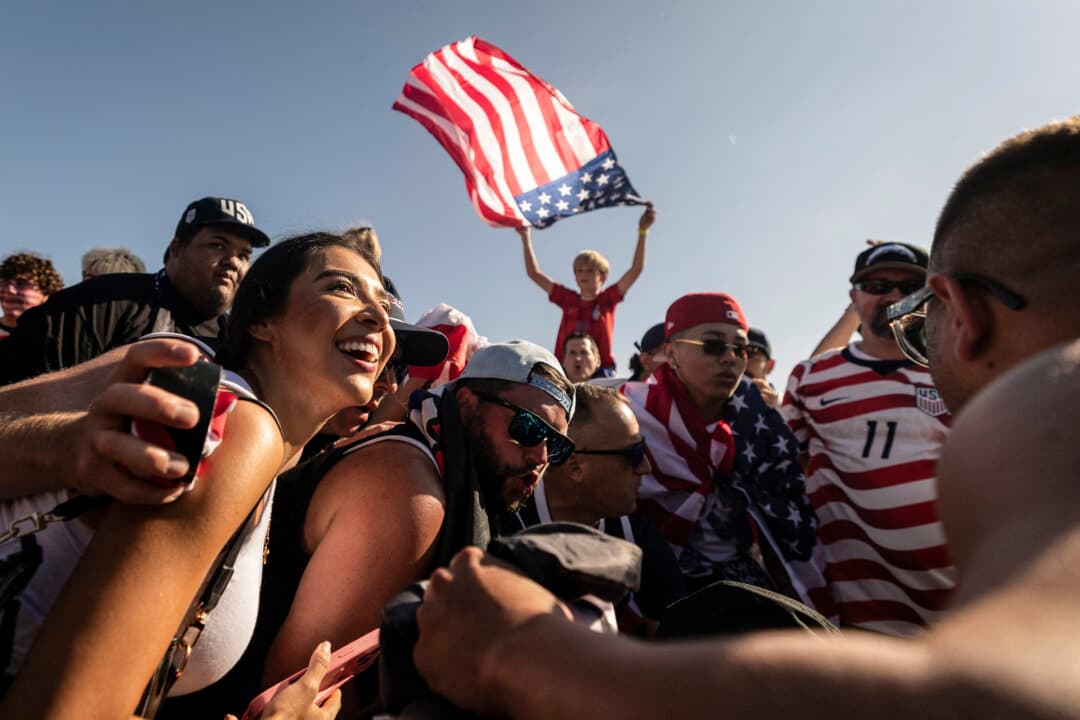U.S. fans cheer for their team ahead of the 2026 World Cup Group D football match between Turkey and the USA at the Los Angeles Stadium in Inglewood on June 25, 2026. (Etienne Laurent/AFP via Getty Images)