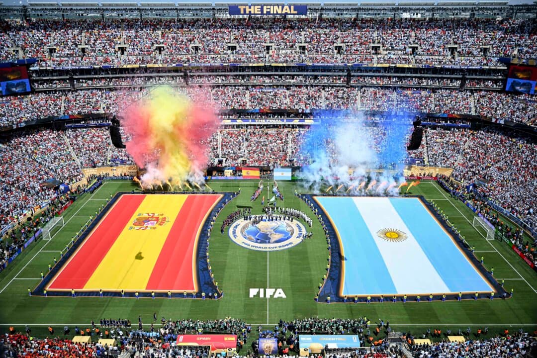 The Spanish and Argentine flags are displayed on the pitch ahead of the 2026 World Cup football tournament final match between Spain and Argentina at the New York New Jersey Stadium in East Rutherford, N.J., on July 19, 2026. (Mauro Pimentel/AFP via Getty Images)