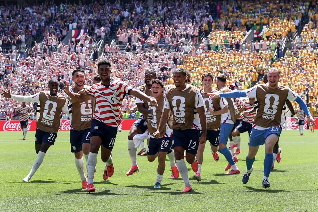 Alex Freeman #16 of the United States celebrates with teammates after scoring his team's second goal during the FIFA World Cup 2026 Group D match between the USA and Australia at Seattle Stadium in Seattle, Washington, on June 19, 2026. (Jamie Squire/Getty Images)