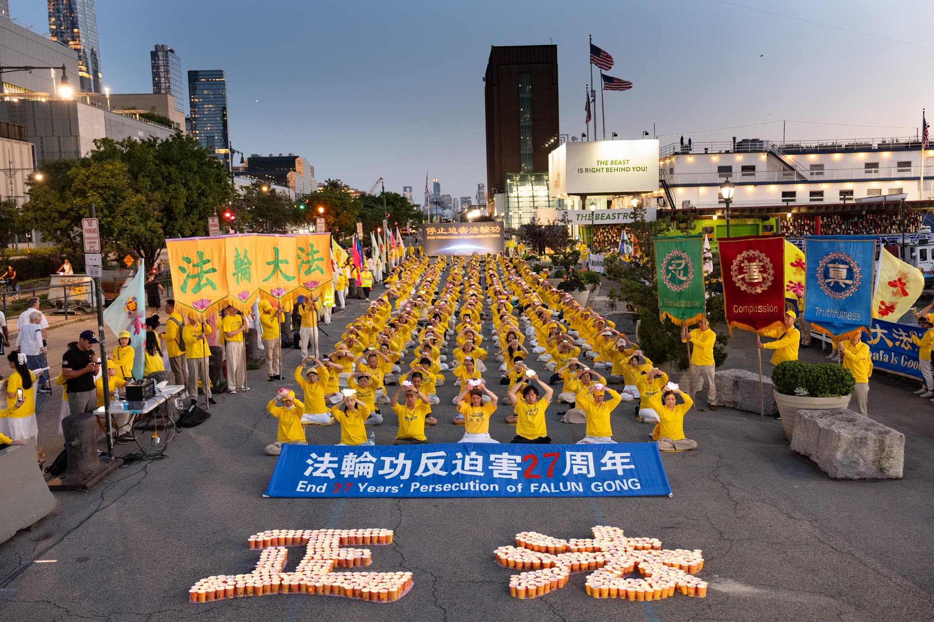 Falun Gong practitioners participate in a vigil in New York City to mark 27 years of the persecution of Falun Gong by the communist party in China on July 20, 2026. (Larry Dye/The Epoch Times)