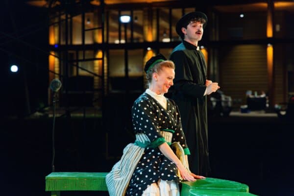 Jodi Gage and Gabriel Armstrong onstage in "The Importance of Being Earnest." (Josh Darr)