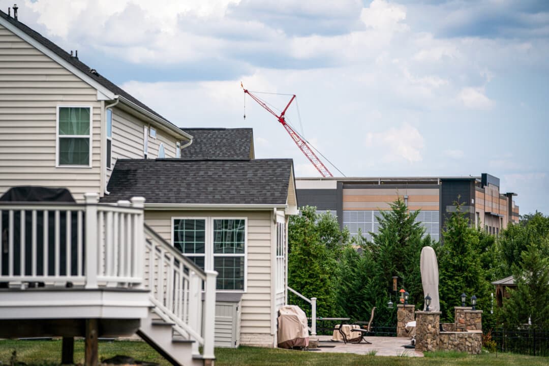 An Amazon Web Services data center near single-family homes in Stone Ridge, Va., on July 17, 2024. A research group counted blocks or delays from local opposition to at least 75 data center projects in the first quarter of 2026—mostly over concerns about electricity prices, water use, and noise pollution. (Nathan Howard/Getty Images)