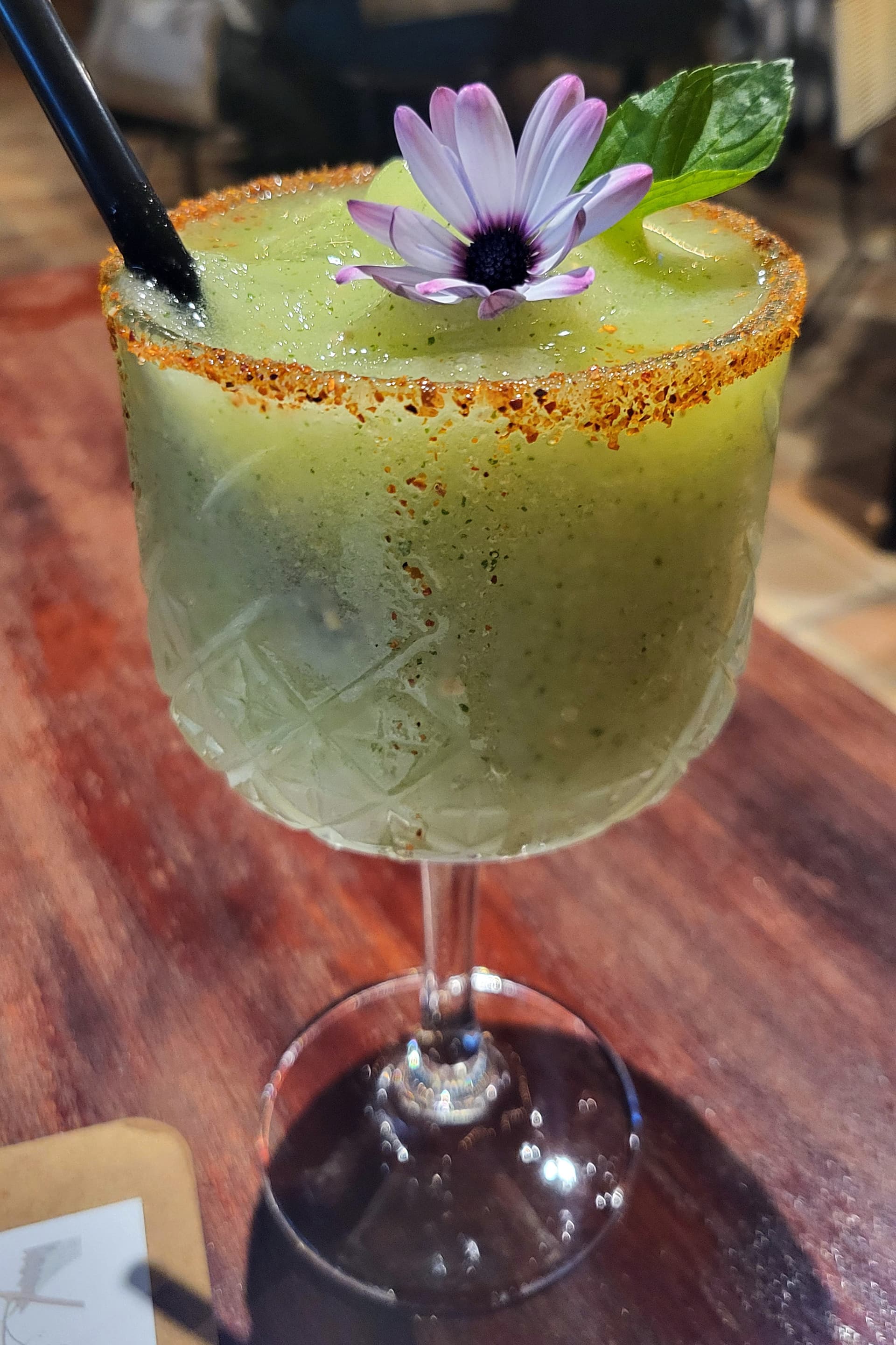 A cucumber and mezcal cocktail at a rooftop bar overlooking Colima's central square. (Daniel Hernandez/Los Angeles Times/TNS)