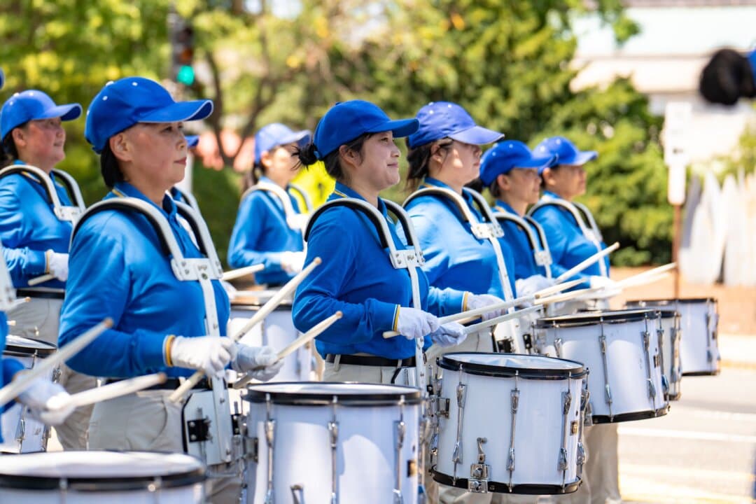 Tian Guo marching band in Washington on July 23, 2026. (Samira Bouaou/The Epoch Times)
