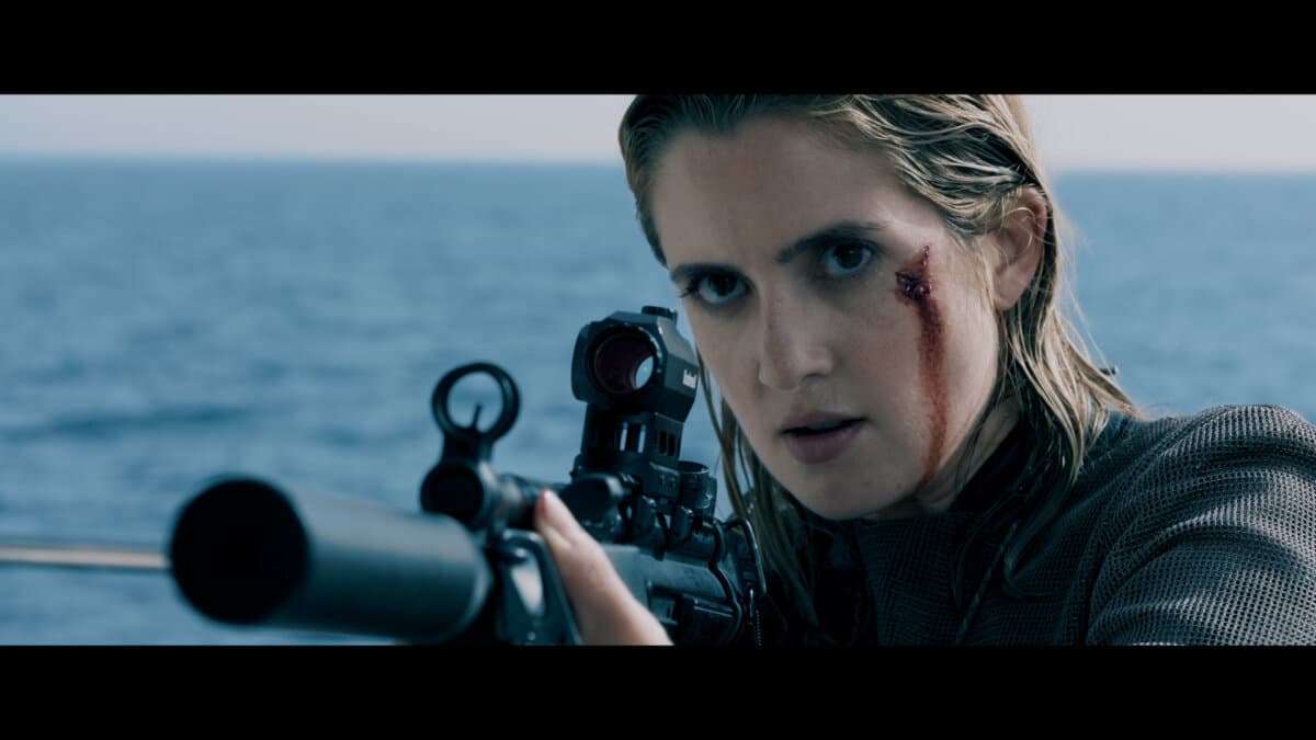 Tatiana (Laura Marano) defends herself, in "Above and Below." (Aura Entertainment)
