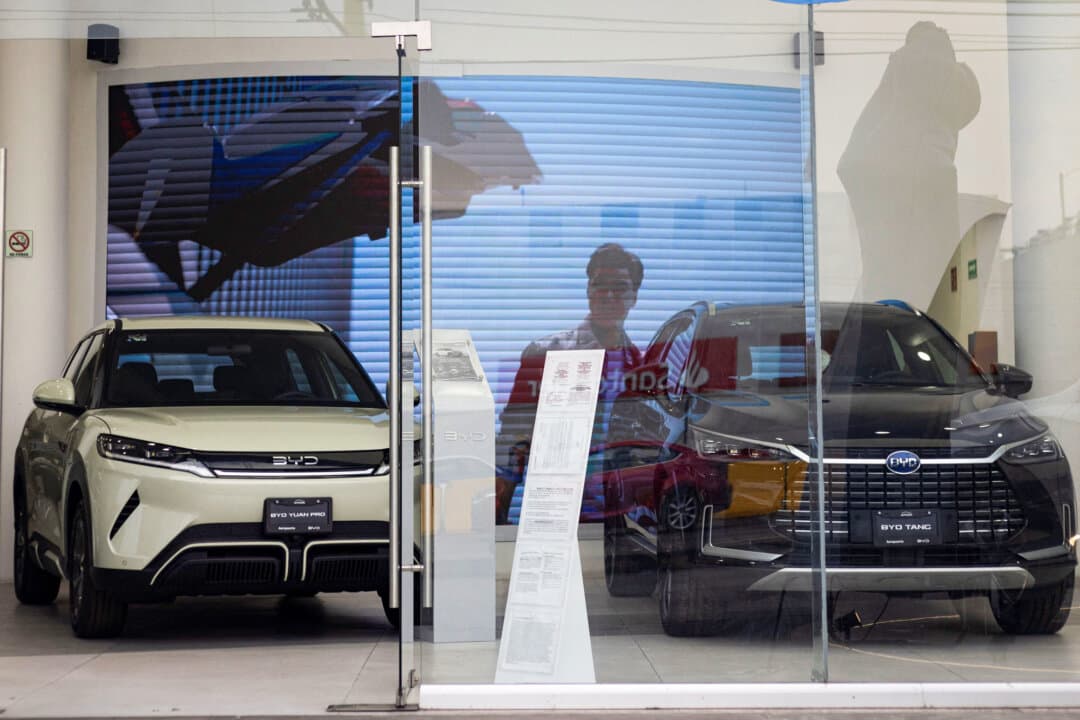 Cars from the Chinese electric car brand BYD are displayed in a store in Mexico City on March 3, 2025. BYD is among the finalists to buy a Nissan–Mercedes-Benz plant in Aguascalientes, Mexico, which has a production capacity of 230,000 vehicles per year. (Quetzalli Nicte-Ha/Reuters)
