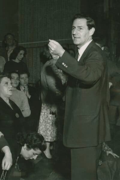 Menotti directing his opera "The Saint of Bleecker Street," 1955. (Public Domain)