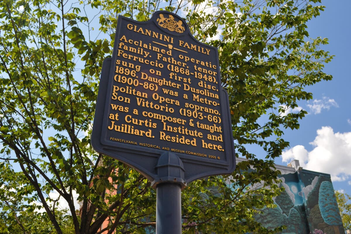 Historical marker in Philadelphia for the acclaimed operatic Giannini Family: Father, tenor Ferruccio (1868–1948), daughter Dusolina (1899–1986), and son Vittorio. (<a href="https://commons.wikimedia.org/wiki/User:Nick-philly">Nick-philly</a>/<a href="https://creativecommons.org/licenses/by-sa/4.0">CC BY-SA 4.0</a>)