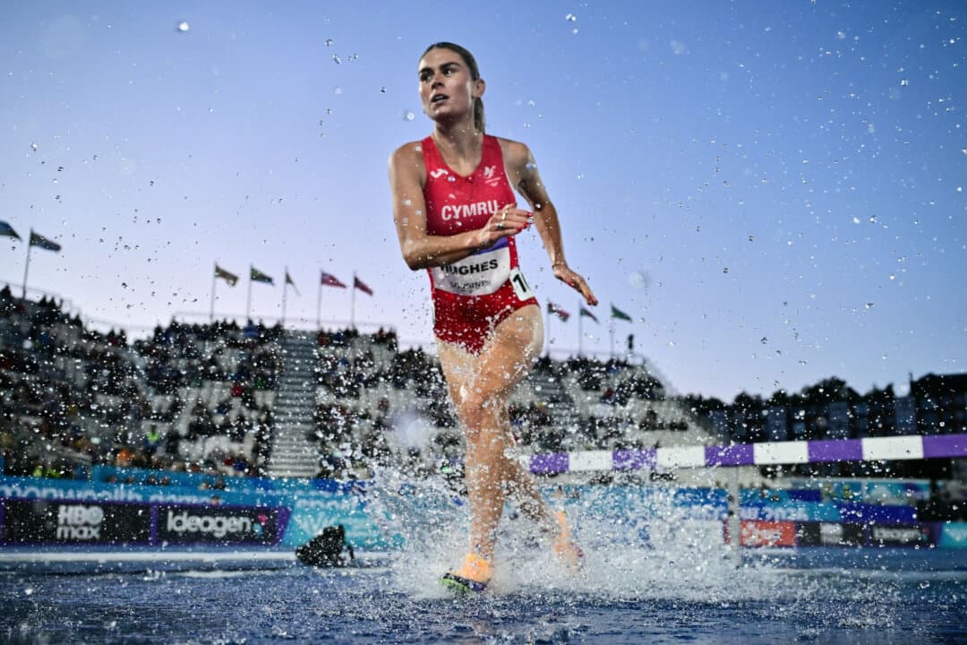 Wales's Cari Hughes competes in the women's 3,000-meter steeplechase final during the athletics event at the Commonwealth Games, in Glasgow, Scotland, on July 29, 2026. (Ben Stansall/AFP via Getty Images)