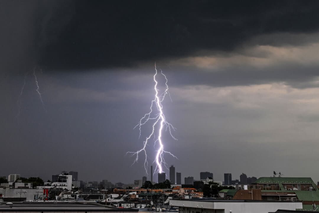 Lightning strikes a building in Tokyo on July 30, 2026. (Andrew Caballero-Reynolds/AFP via Getty Images)