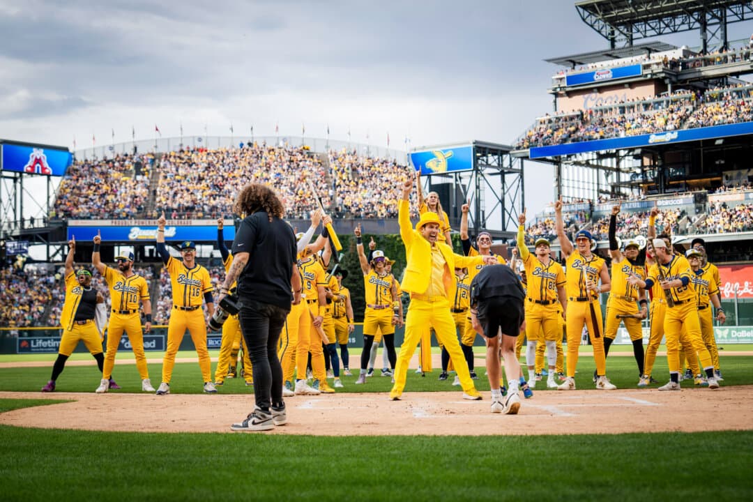 Banana Ball creator Jesse Cole with the Savannah Bananas in Denver on Aug. 15, 2026. (Madalina Kilroy/The Epoch Times)