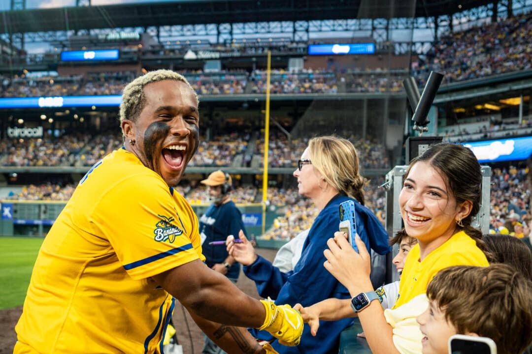 (Left) Savannah Bananas pitcher Connor Harris interacts with fans during the Savannah Bananas versus Indianapolis Clowns game at Coors Field in Denver on Aug. 15, 2026. (Center) Pitcher Connor Harris signs an autograph for a fan in Denver on Aug. 15, 2026. (Right) Savannah Bananas player Ty “pookie” Jackson interacts with fans during the game at Coors Field in Denver on Aug. 15, 2026. (Madalina Kilroy/The Epoch Times)