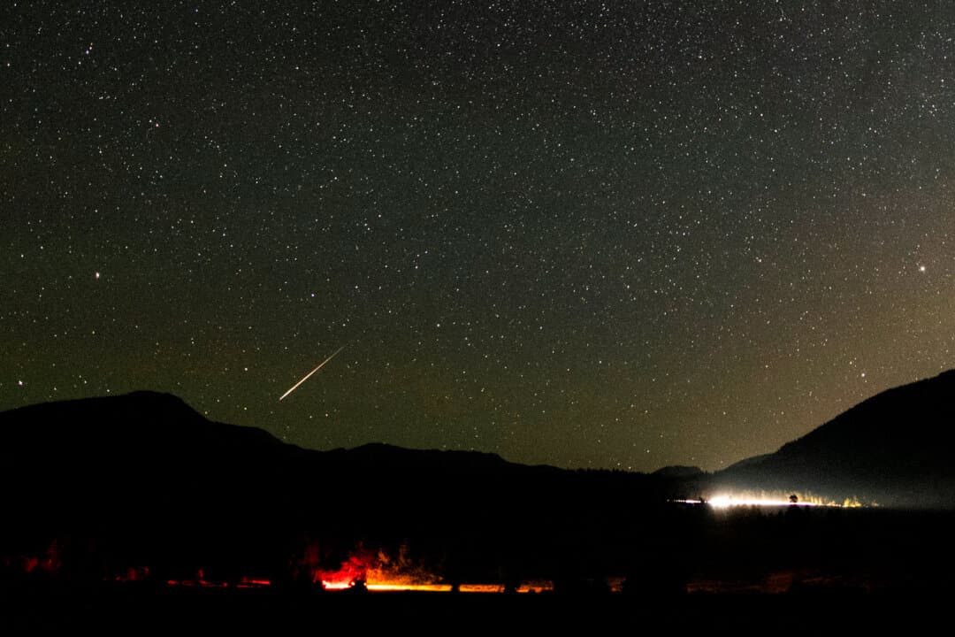 A Perseid meteor streaks across the sky over Rocky Mountain National Park in Colorado on Aug. 13, 2018. The National Park Service said the 2026 meteor shower can be seen from anywhere on Earth with dark skies. (Stan Honda/AFP via Getty Images)