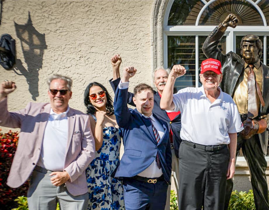 Organizer Steven Barber (L), businessman Anthony Constantino (C), sculptor George Lundeen (2nd R), and President Donald Trump during the unveiling of “Defiance Monument,” a seven-foot bronze statue of Trump, at Trump International Golf Club in West Palm Beach, Fla., on April 12, 2025. (Courtesy of Steven Barber)