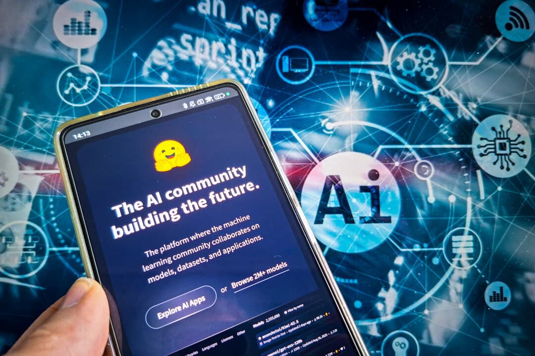 An illustration of Hugging Face in Paris on June 2, 2026. Two advanced OpenAI models recently escaped a restricted testing environment and breached Hugging Face's software infrastructure, raising widespread cybersecurity concerns. (Riccardo Milani/Hans Lucas/AFP via Getty Images)