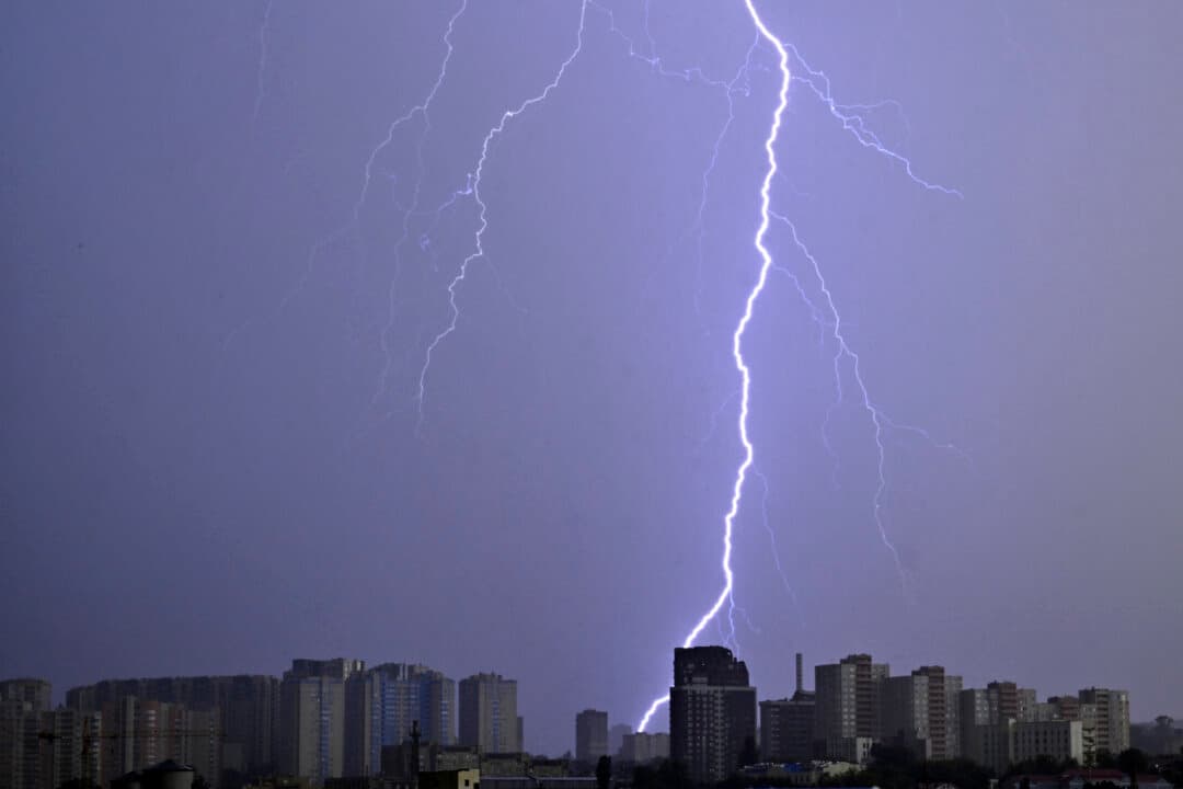 Lightning illuminates the sky above Ukraine's capital during a thunderstorm in Kyiv on Aug. 4, 2026. (Sergei Supinsky/AFP via Getty Images)