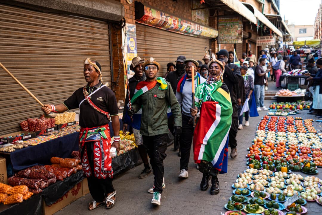 Protesters march to call for the removal of illegal immigrants in Alexandra, South Africa, on Aug. 6, 2026. Tensions and intimidation have forced more than 176,000 people to flee, according to an AFP tally based on figures released by African governments that have repatriated their nationals. (Emmanuel Croset/AFP via Getty Images)