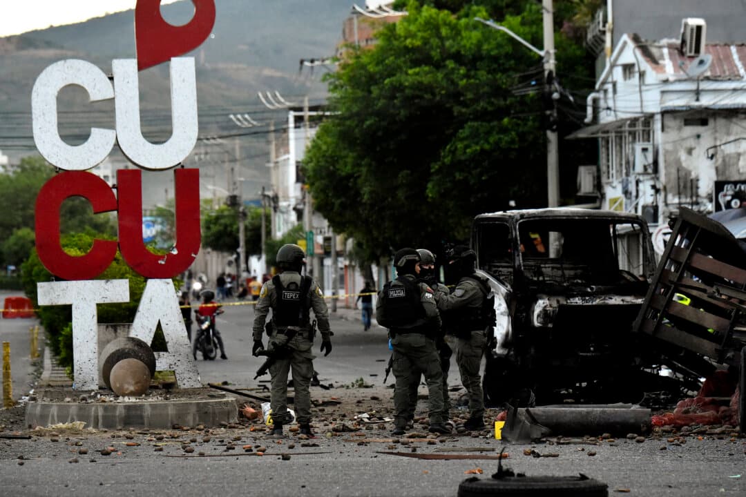 Police inspect the wreckage of a truck after a car bomb detonated near a police station in Cucuta, Colombia, on Aug. 1, 2026. (Schneyder Mendoza/AFP via Getty Images)