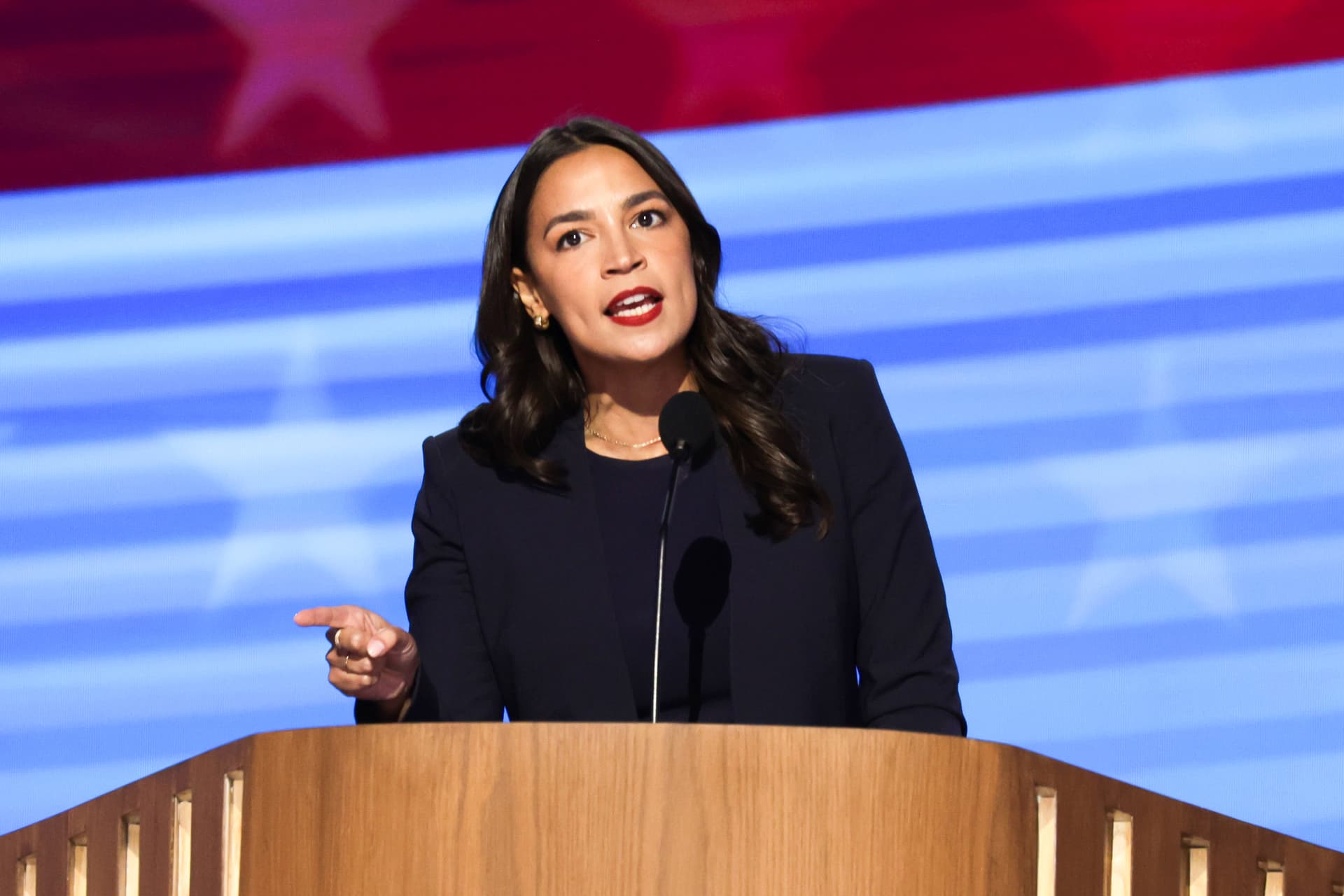 Rep. Alexandria Ocasio-Cortez (D-N.Y.) speaks onstage during the first day of the Democratic National Convention at the United Center in Chicago, Illinois, on Aug. 19, 2024. (Alex Wong/Getty Images)