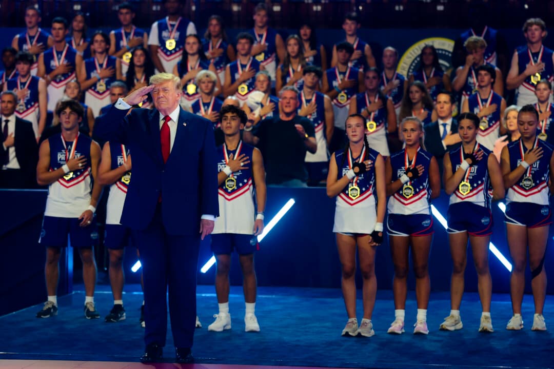 President Donald Trump salutes at the 2026 Patriot Games at SPIRE Academy in Geneva, Ohio, on Aug. 11, 2026. The Patriot Games is a youth athletics competition featuring 14 to 17-year-old students from across the country celebrating the nation's 250th anniversary. (Anna Moneymaker/Getty Images)