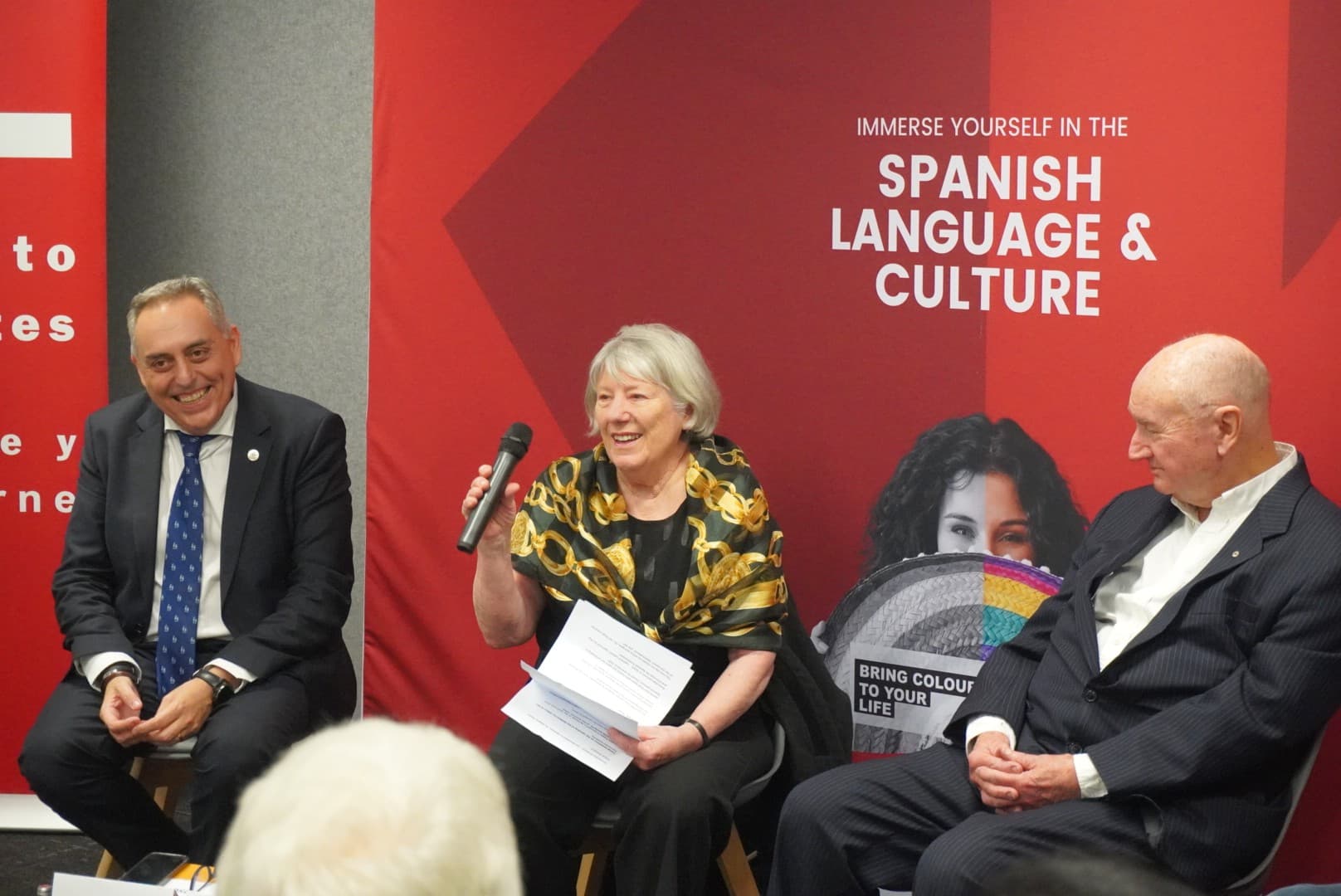 Director Germinal de Gracia (L) of the Instituto Cervantes, alongside donors Julie and Ian McPhee, speaking at the handover of replicas of Miguel de Cervantes' original "Don Quixote" published in two parts in 1605 and 1615, at the Instituto Cervantes in Melbourne, Australia on Aug. 13, 2026. (Courtesy of Minh Anh)