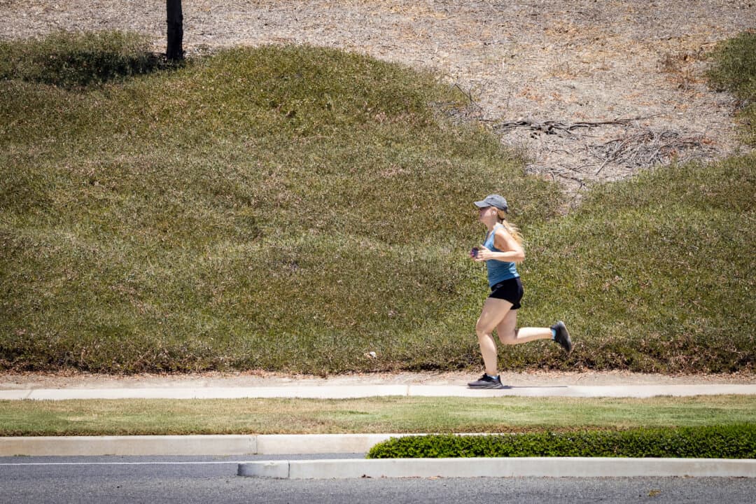 A jogger in Ladera Ranch, Calif., on July 24, 2026. Residents hope all the attention on Ladera Ranch will be a catalyst for something bigger. (John Fredricks/The Epoch Times)