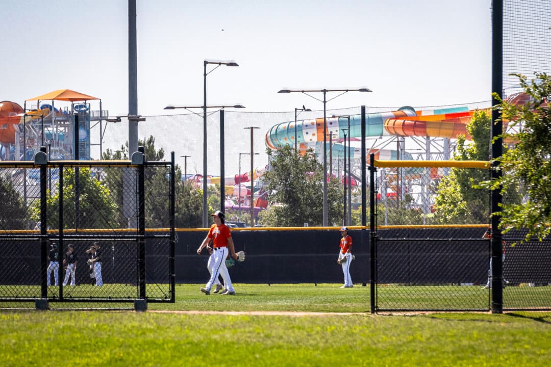Players play baseball at the Great Park of Irvine, Calif., on July 11, 2023. (John Fredricks/The Epoch Times)