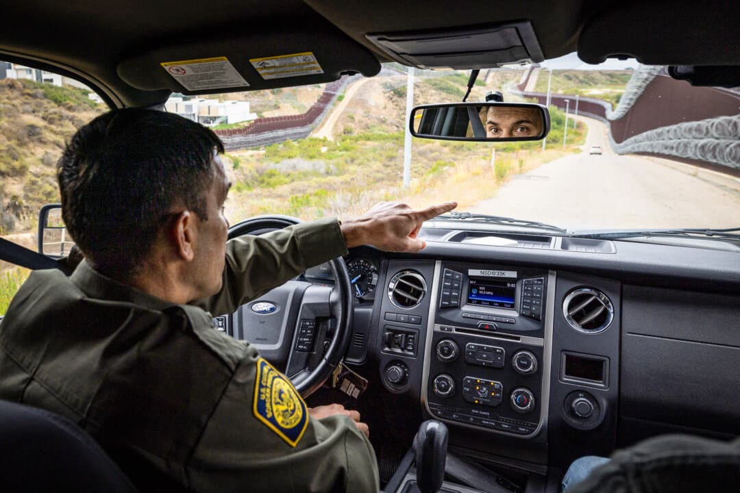 (Top, Bottom Left) Justin M. De La Torre, chief patrol agent for the U.S. Border Patrol's San Diego sector, monitors the southern border wall outside of San Diego, on May 27, 2026. De La Torre said cartels are using dating apps to engage unsuspecting travelers in drug or human smuggling. (Bottom Right) U.S. Border Patrol agents monitor the southern border outside of San Diego, on May 27, 2026. (John Fredricks/The Epoch Times)