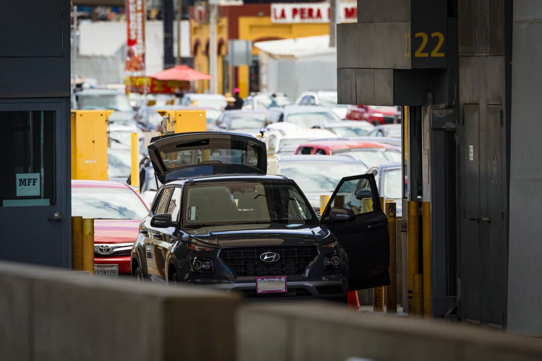 A vehicle is searched at the San Ysidro Port of Entry outside of San Diego on May 26, 2026. (John Fredricks/The Epoch Times)