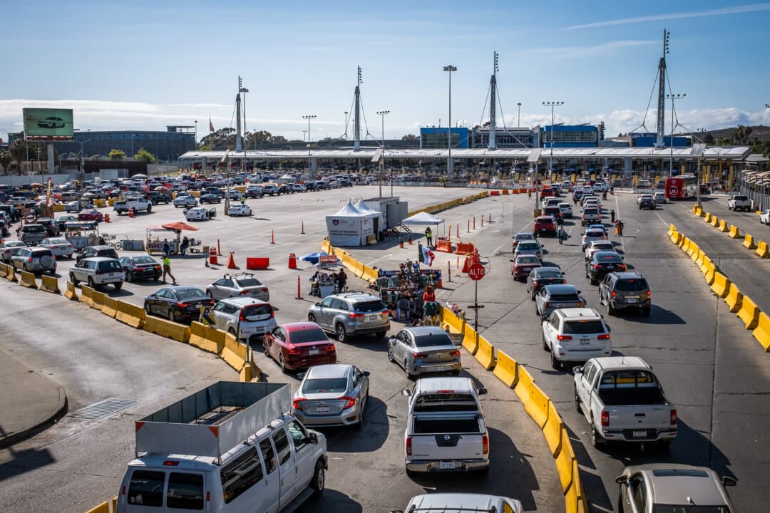 (Top) People prepare to enter Mexico outside of San Diego on May 26, 2026. (Bottom) Entry traffic at the San Ysidro port of entry near San Diego on May 26, 2026. (John Fredricks/The Epoch Times)