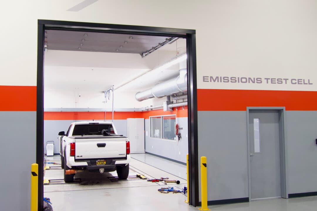 A vehicle sits in an emissions testing cell prior to testing at SEMA’s Detroit Garage in Plymouth, Michigan, on July 28, 2026. (Travis Gillmore/The Epoch Times)