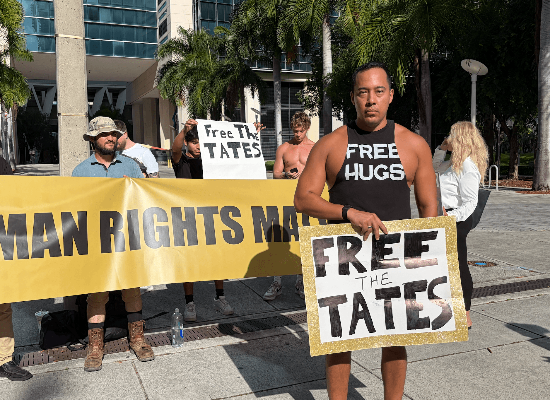 Ben Valen is a staunch Andrew and Tristan Tate supporter, saying the brothers have helped him encourage him to earn more money and have better relationships with his family. Valen stood outside the Miami federal courthouse while the social media stars' custody hearing unfolded inside in Miami on Aug. 27, 2026. (Troy Myers/Epoch Times)